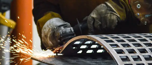 BSF fabricator grinding a Hardox recycling trommel screen in Alexandria, Egypt